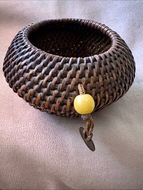 Vintage Handwoven Dark Brown Woven Decorative Basket with Yellow Accent Bead